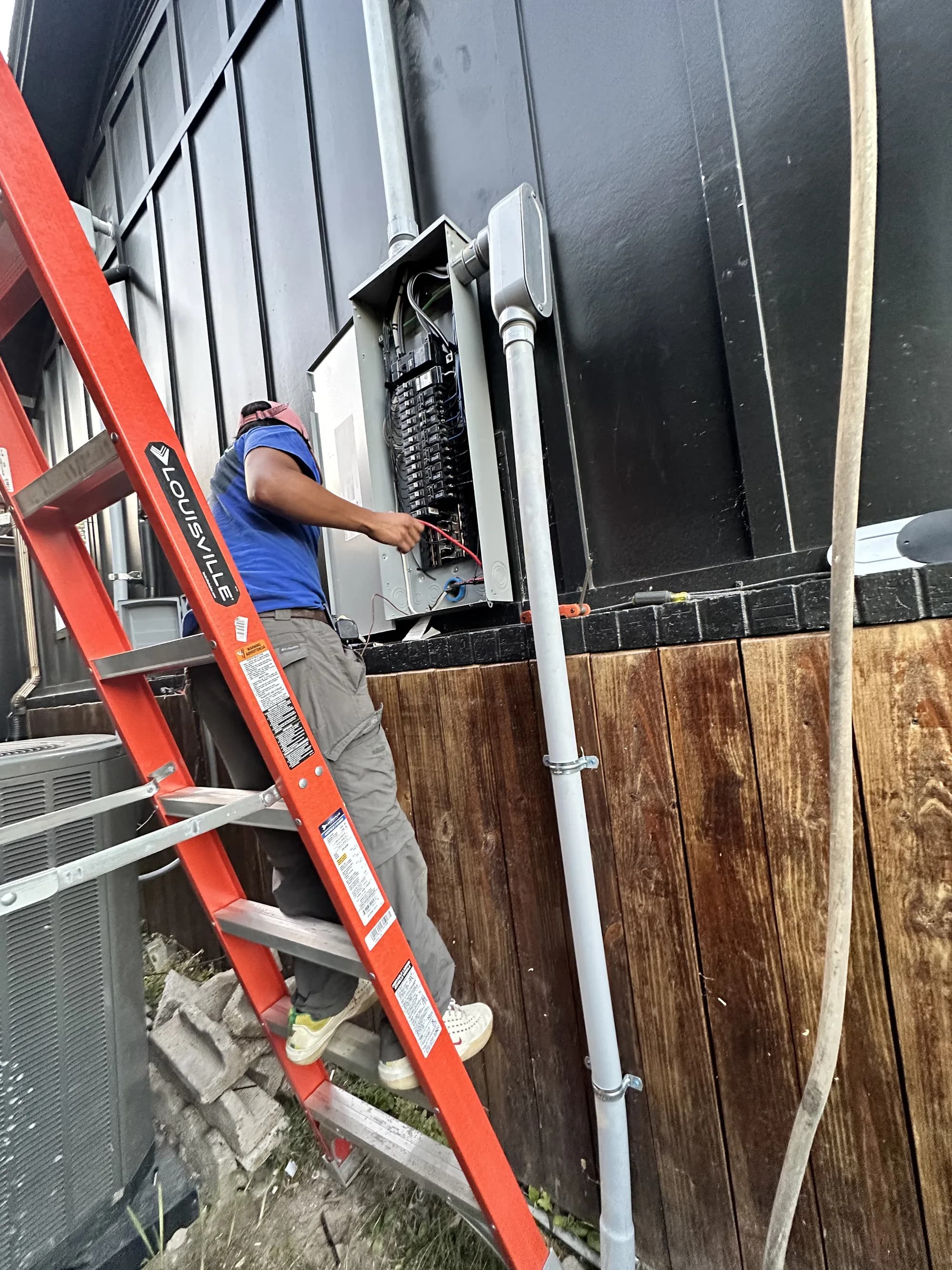 Babcock technician working an active panel repair